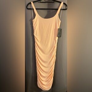 Peach ruched body con dress